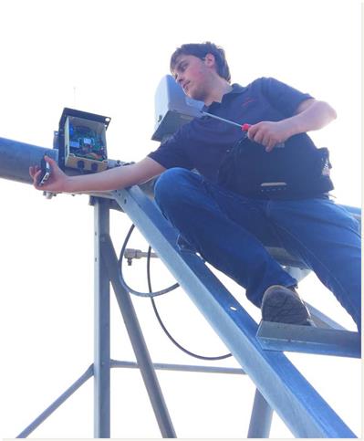 NW Tech Student installing technology